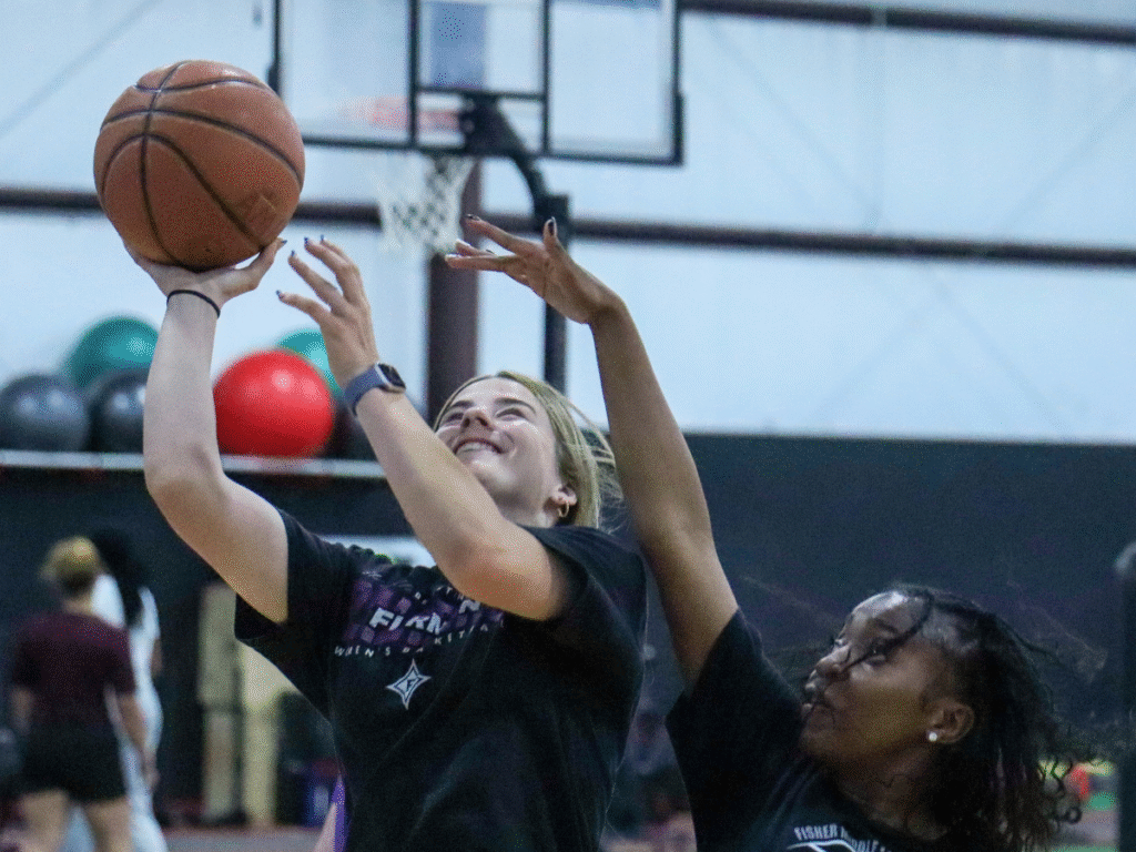 Youth basketball players practicing shooting drills at Amplify Sports