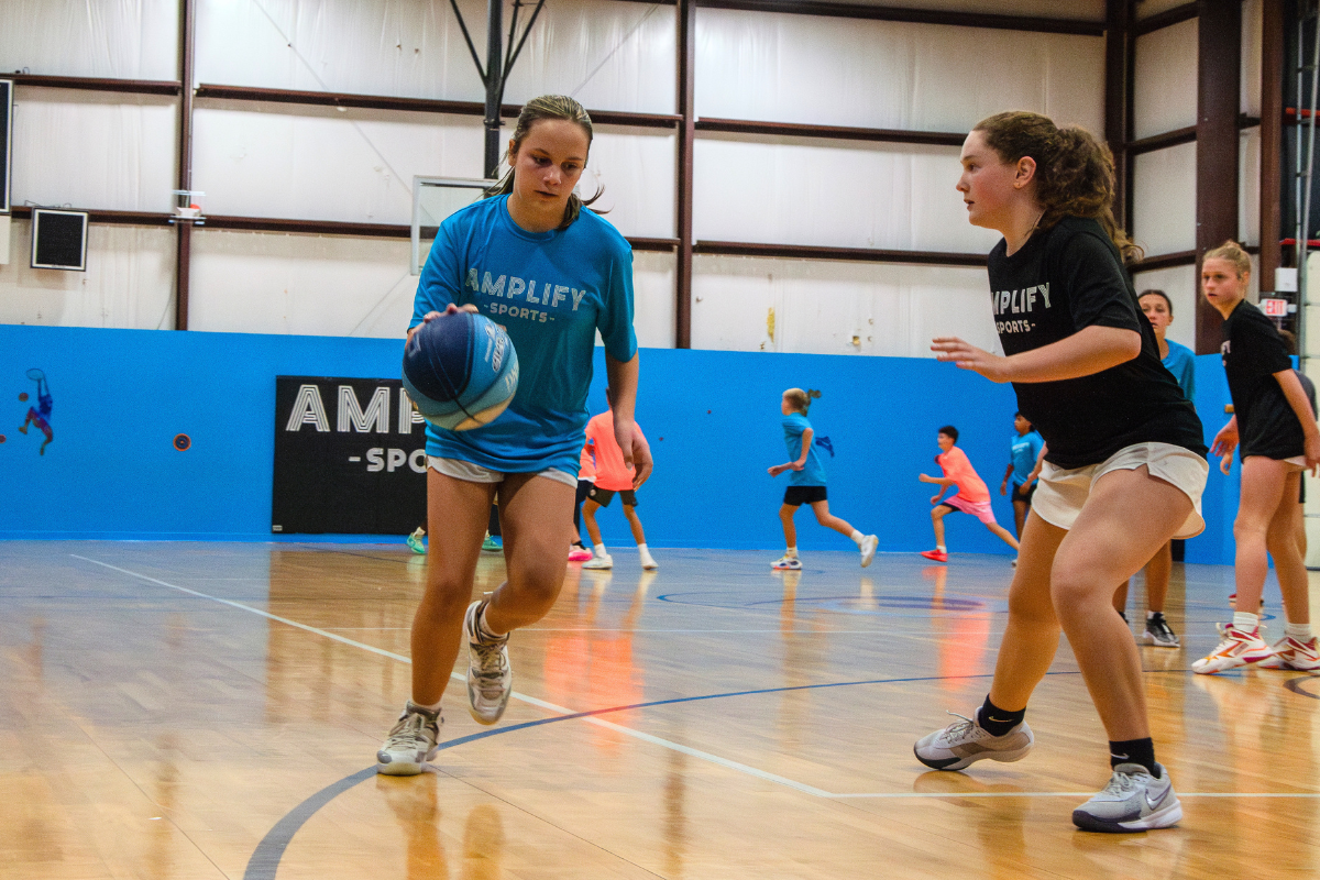 Youth athletes during an Amplify Sports basketball game